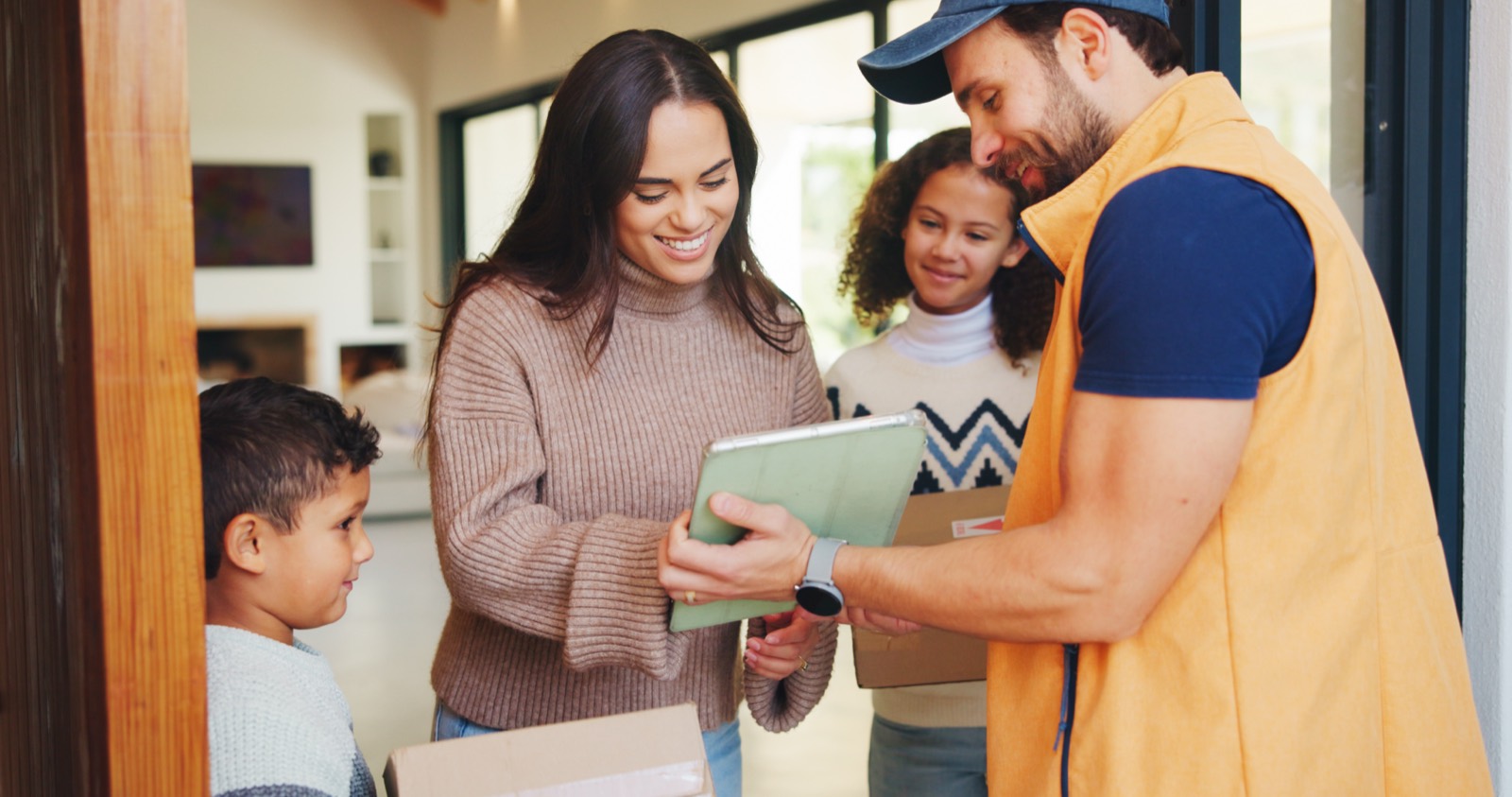 Family receiving a package at home